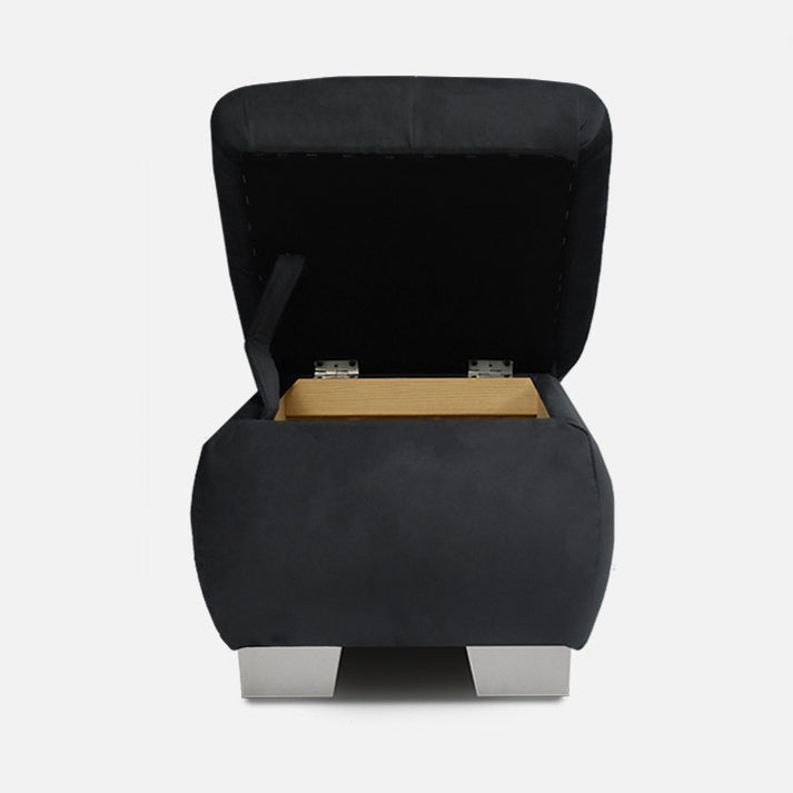 stilingas juodas pufikas prie minksto kampo